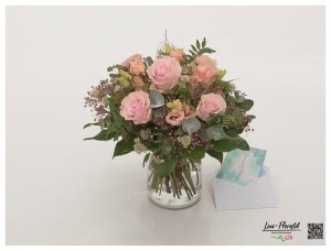 Birthday bouquet with roses, eucalyptus, astrantia, lisianthus and gypsophila