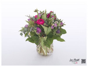 Bouquet with ranunculus, tulips and chamomile