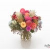 Bouquet with roses, chamomile, gerbera, santini, ranunculus, wax flowers and balloons