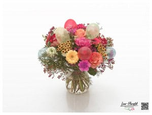 Bouquet with roses, chamomile, gerbera, santini, ranunculus, wax flowers and balloons