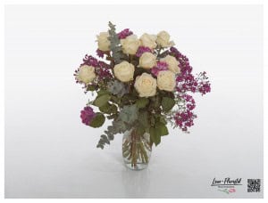 Bouquet with roses, carnations, eucalyptus and wax flowers