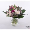 Summer bouquet with chrysanthemums, carnations, chamomile, black tie and gypsophila