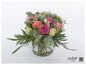 Bouquet with colorful Ecuador roses, gypsophila, eucalyptus and lisianthus