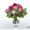 Colorful Ecuador roses, olive and white gypsophila