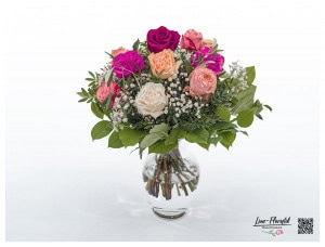 Colorful Ecuador roses, olive and white gypsophila