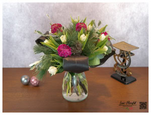 Bouquet with ranunculus, tulips, silky pine and black tie