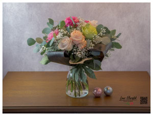 Bouquet of roses for a birthday with eucalyptus, black tie and gypsophila