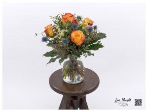 Ecuador roses Encanto, thistles, craspedia and chamomile