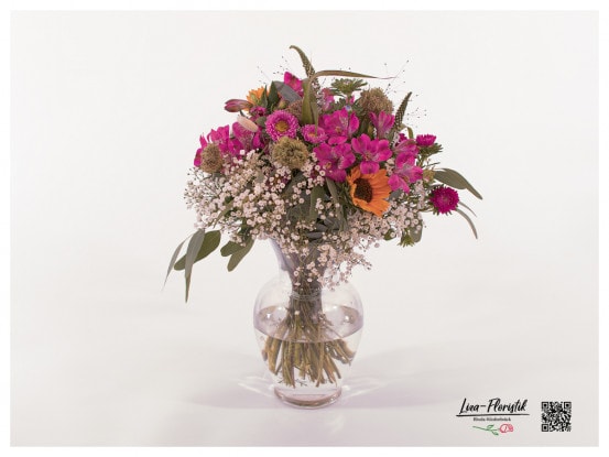 Bouquet with asters, sunflowers, eucalyptus, gypsophila, alstromeria and veronica