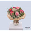 Mixed bouquet of flowers for a birthday with Ecuador roses and white gypsophila