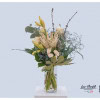Condolence bouquet with protea, roses, polyantharoses, amaryllis and eucalyptus