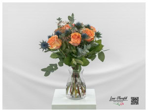Bouquet with thistles, orange roses, golden gypsophila and eucalyptus