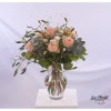 Bouquet with mistletoe, roses, lisianthus and eucalyptus