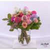 Colorful birthday bouquet with gerberas, roses, lisianthus, golden gypsophila and balloons