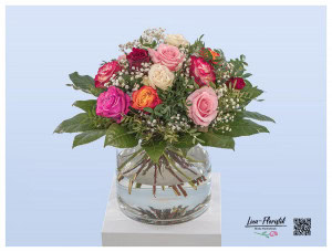 Colorful bouquet with roses and white gypsophila