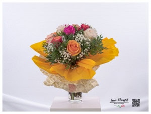 Birthday bouquet - colorful roses and delicate gypsophila