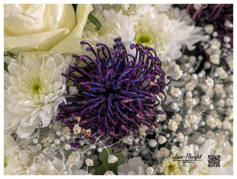 Purple protea and chrysanthemums in detail