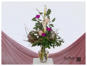 Bouquet with calla lilies, roses, carnations and eucalyptus