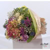 Bouquet of flowers with carnations, hydrangea, chrysanthemums, thistle, roses and gypsophila for a birthday