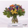 First spring bouquet with colorful tulips, santini, hyacinths, wax flowers, eucalyptus and gypsophila