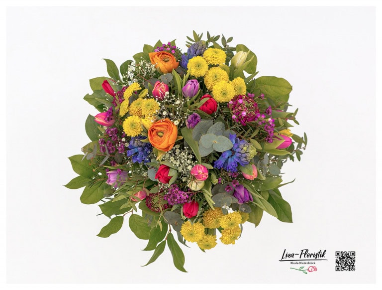 Spring bouquet with colorful tulips, santini, hyacinths, wax flowers, eucalyptus and gypsophila in detail