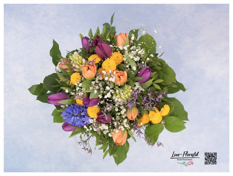 Spring bouquet with hyacinths, tulips, santini, gypsophila and statize in detail