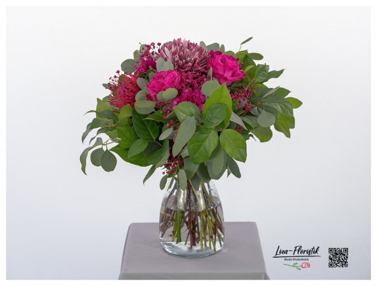 Bouquet with pink roses "Hearts", pink Gerber, pink gypsophila, pink protea, yellow and pink lisianthus and eucalyptus