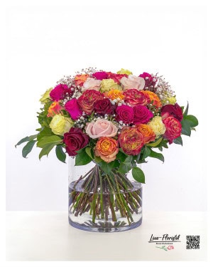 Unique bouquet with colorful Ecuador roses and gypsophila