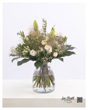 Bouquet with lilies, lisianthus, poppies, gypsophila, wigbush, hydrangea and eucalyptus