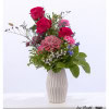 Bouquet with pink roses, pink hydrangea, pink carnations, white gypsophila, statice and astrantia