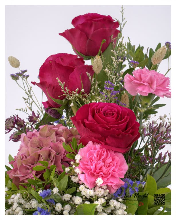 Detail: roses, hydrangea, carnations, gypsophila, statice and astrantia