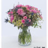 Bouquet with pink gerberas, pink roses, thistles, sea lavender and chamomile