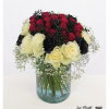 Bouquet for a 40th birthday: A magnificent arrangement of red, white and black roses, in which the number "40" is artfully designed in red flowers, framed by fine white gypsophila.