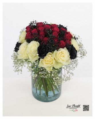 Bouquet for a 40th birthday: A magnificent arrangement of red, white and black roses, in which the number "40" is artfully designed in red flowers, framed by fine white gypsophila.