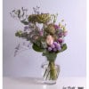 Tiered bouquet with artichokes, pink rose, purple lisianthus, statice, purple santini and eucalyptus
