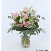 Airy Bouquet with roses, carnations, gypsophila and eucalyptus leaves, loosely tied in a slightly rounded, natural silhouette, which has a dynamic and harmonious appearance due to the different height arrangements of the flowers.
