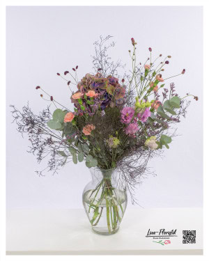 Airy bouquet with carnations, hydrangea, wildflowers, eucalyptus, lisianthus and sea lavender