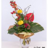 Birthday greeting - bouquet of flowers with anthurium, chrysanthemums, protea, apple and larch branches