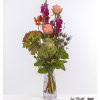 Tiered bouquet with ornamental kale, delicate apricot-colored roses, bright purple snapdragons and lively rose hips - a real highlight for any occasion.