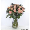 Elegant bouquet of roses, framed by dark gypsophila and eucalyptus, which radiates a special depth and sophistication thanks to its subtle mix of colors.