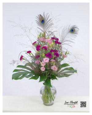 Bouquet with peacock eyes, carnations, lisianthus and statice