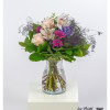 Elegant bouquet with pastel-colored roses, orchids, purple hydrangea and delicate gypsophila, combined with fresh green - a stylish eye-catcher for every occasion