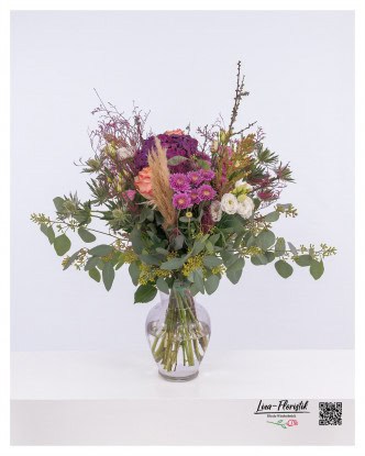 Modern bouquet with roses, hydrangeas, chrysanthemums, thistles, eucalyptus, sea lavender, lisianthus, larch and pampas grass