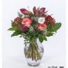 Elegant bouquet of flowers with amaryllis, roses and lisianthus in autumnal colors - ideal as a stylish gift or as an elegant decoration for your home.