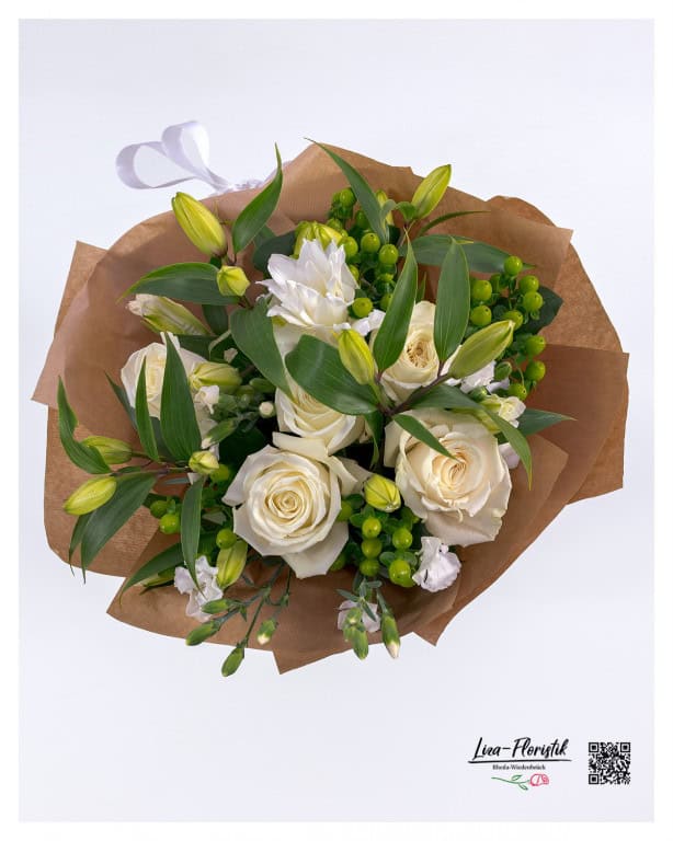 Harmonious bouquet of white roses, carnations, lilies and green hypericum