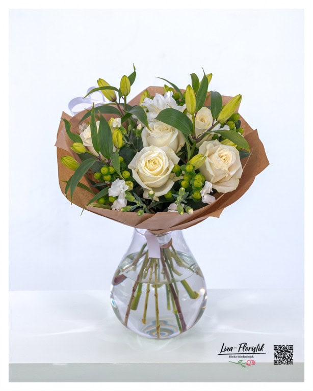 Classic bouquet with white roses, carnations, lilies and green hypericum - ideal for a wedding, birthday or as a stylish gift