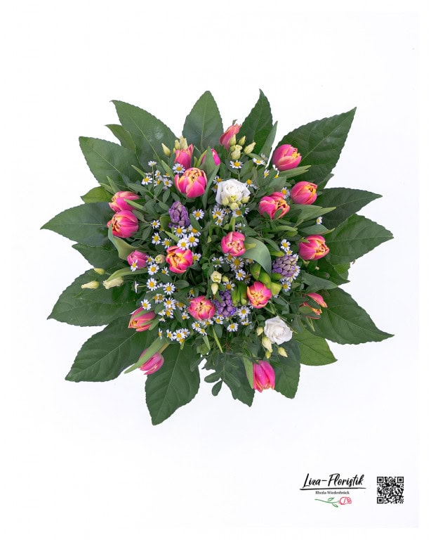 Spring greeting from above An artfully tied bouquet with bright tulips, elegant lisianthus, fragrant hyacinths and delicate chamomile flowers - the perfect harmony of colors and shapes can be seen from a bird's eye view. A highlight for every spring decoration!