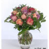 A harmonious bouquet of roses in warm shades of red, pink, purple and yellow. A great bouquet for your birthday.