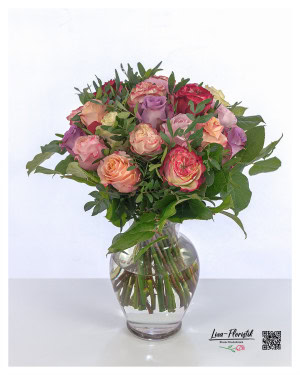 A harmonious bouquet of roses in warm shades of red, pink, purple and yellow. A great bouquet for your birthday.