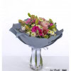 Bouquet in pink, hot pink and white with roses, alstromerias, closed lilies, butterflies and white santini - freshly tied in a harmonious color composition.